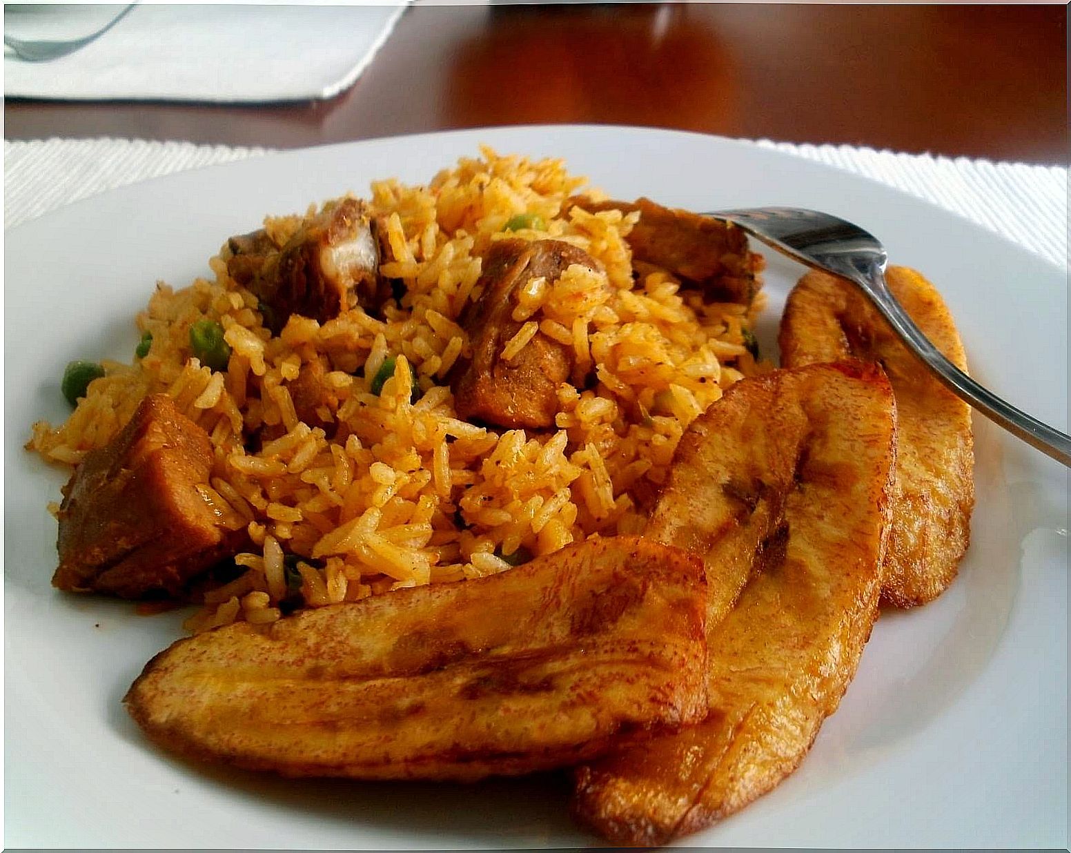 Rice with fried red banana.