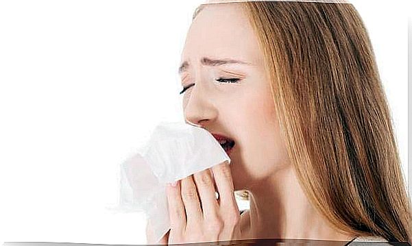 Woman sneezing