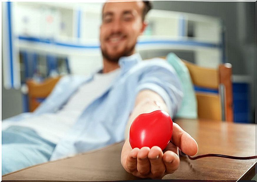 Young man donating blood.