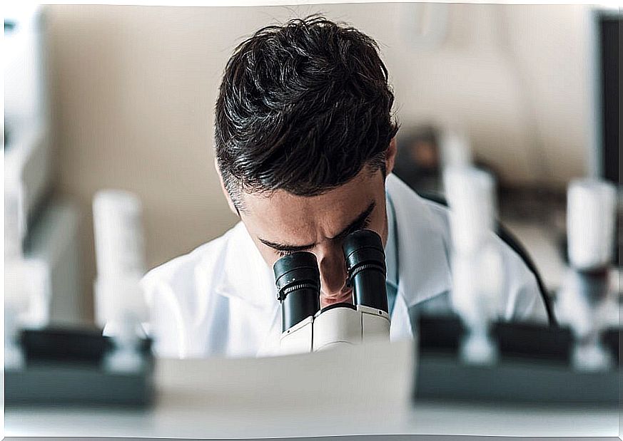 Man analyzing stool samples.