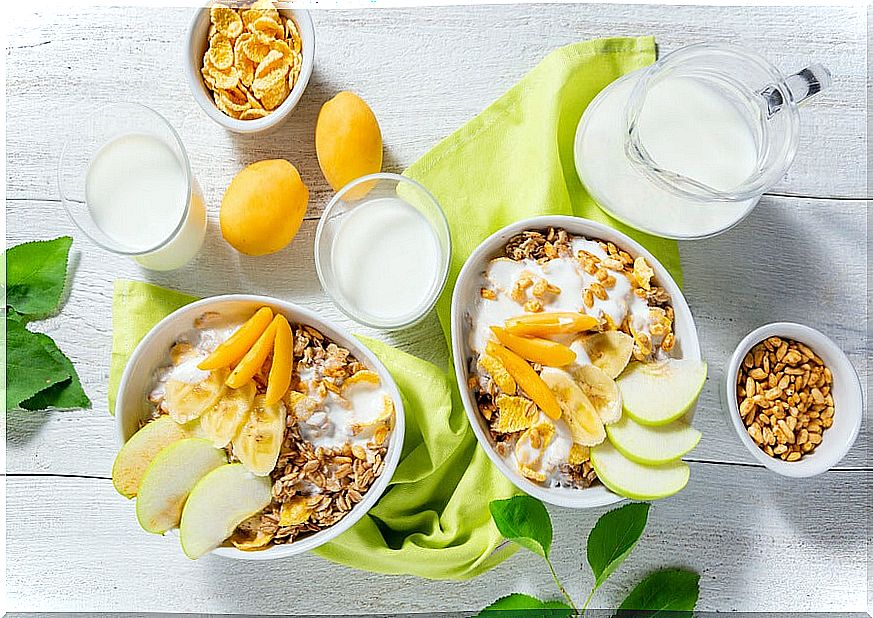 Breakfast with apples, cereal and fruit